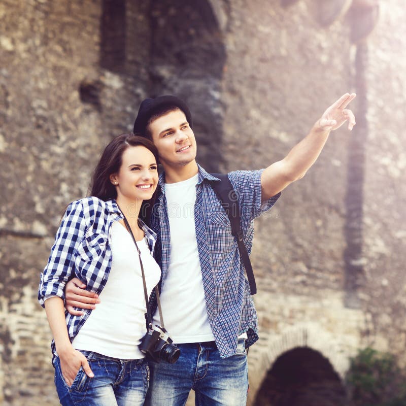 Couple of young travelers: walking around old town stock images Couple of young travelers: walking around old town stock images