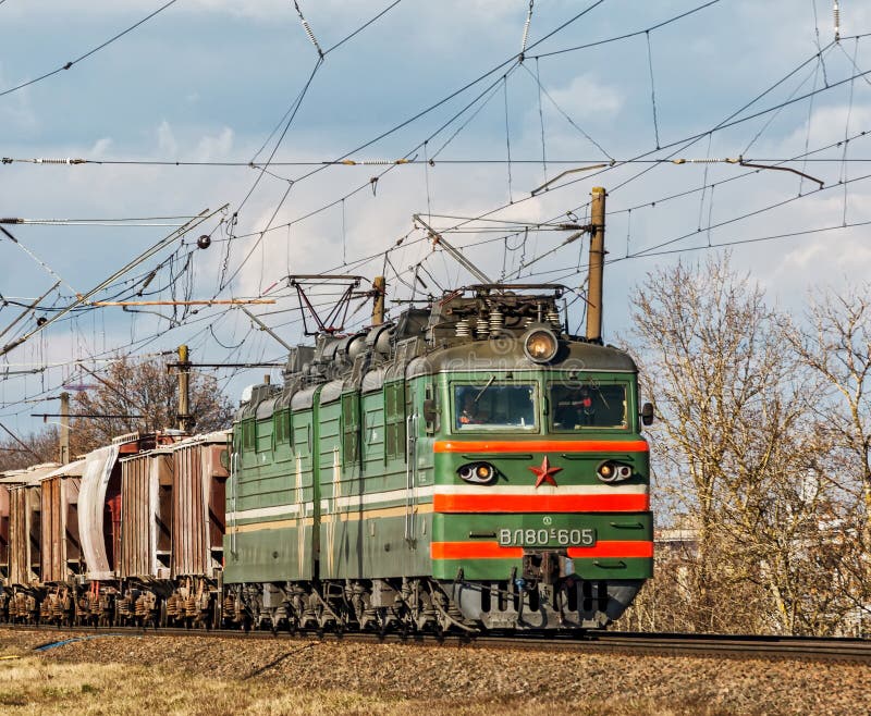 The coupled locomotive VL80-605 pulls freight cars of freight tr royalty free stock photography The coupled locomotive VL80-605 pulls freight cars of freight tr royalty free stock photography