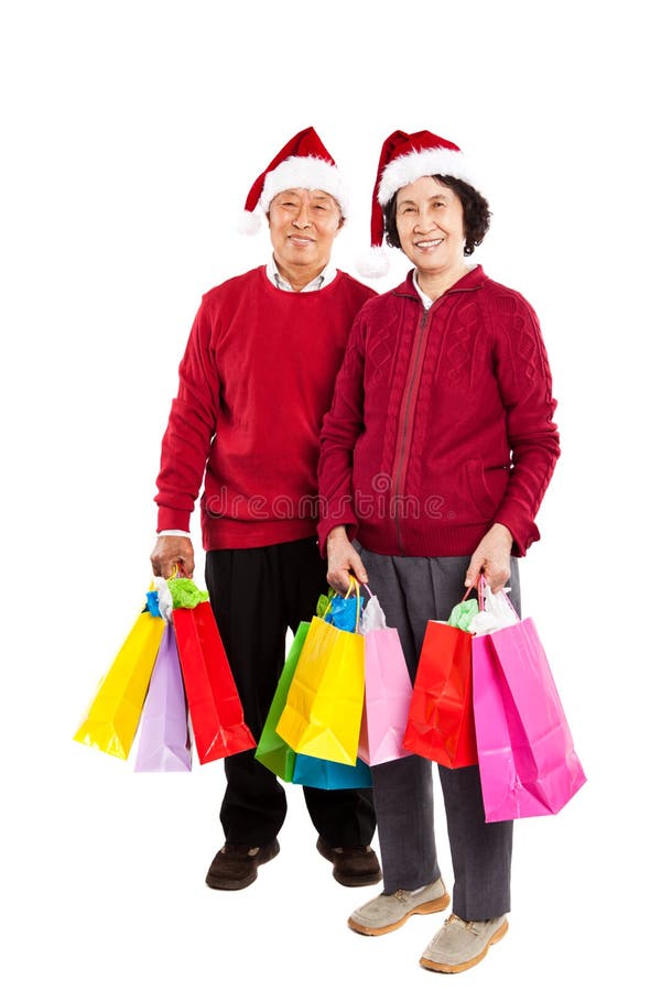 Couples asiatiques aînés célébrant Noël photos libres de droits Couples asiatiques aînés célébrant Noël photos libres de droits