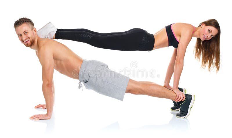 Couples attrayants de sport - homme et femme faisant des exercices de forme physique photos libres de droits Couples attrayants de sport - homme et femme faisant des exercices de forme physique photos libres de droits