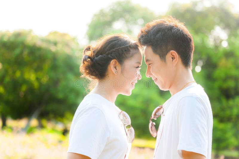 Happy Young Adult Couples at field. Happy Young Adult Couples at field