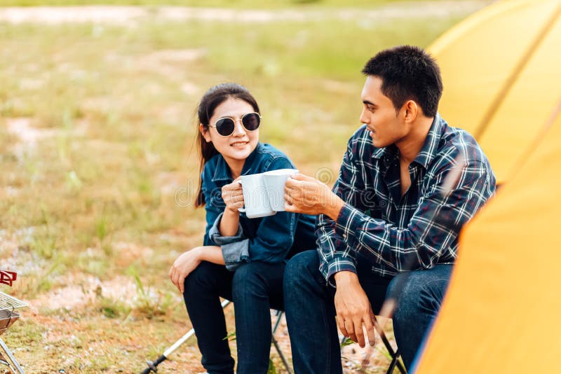 Couples Drink Coffee Together during the Morning Camping Stock Photo ...
