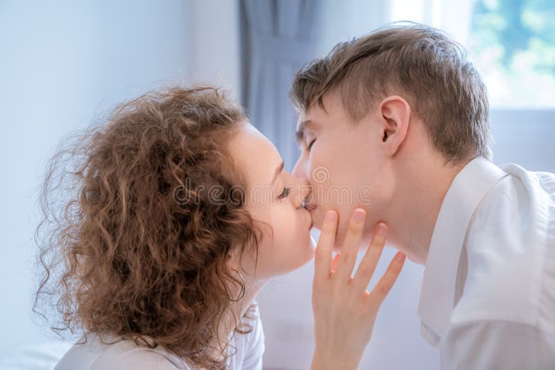 Couples are kissing passionately on the bedroom stock image Couples are kissing passionately on the bedroom stock image