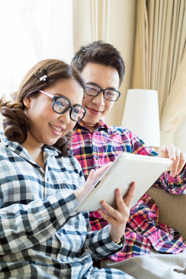 Couples in living room stock image. Image of beauty, couples 30754969