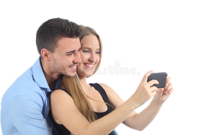 Couple watching social media on the smart phone isolated on a white background. Couple watching social media on the smart phone isolated on a white background