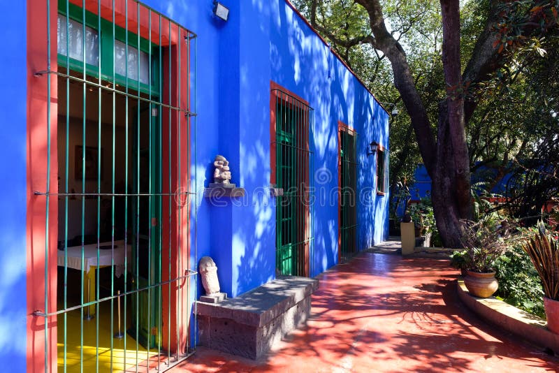 Colorful courtyard at the Frida Kahlo Museum known as the Blue House at Coyoacan in Mexico City. Colorful courtyard at the Frida Kahlo Museum known as the Blue House at Coyoacan in Mexico City