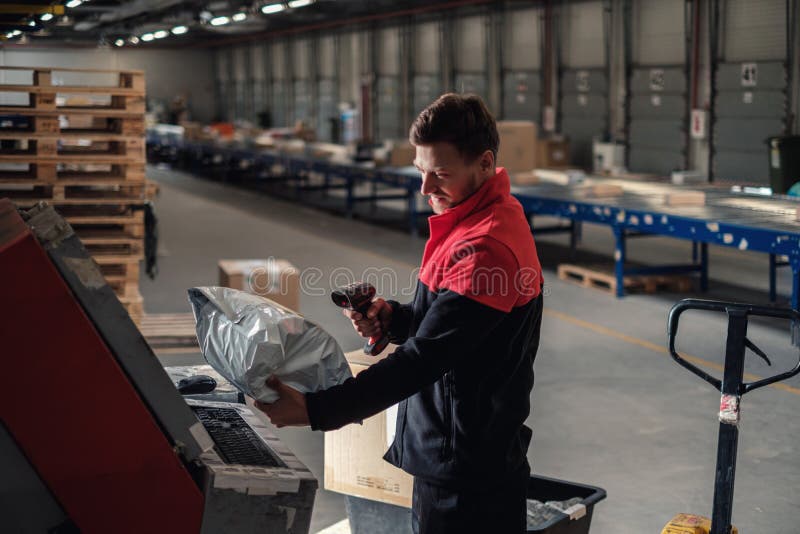 Courier Picks Up Package on a Warehouse Stock Photo Image of parcel, order 169607502