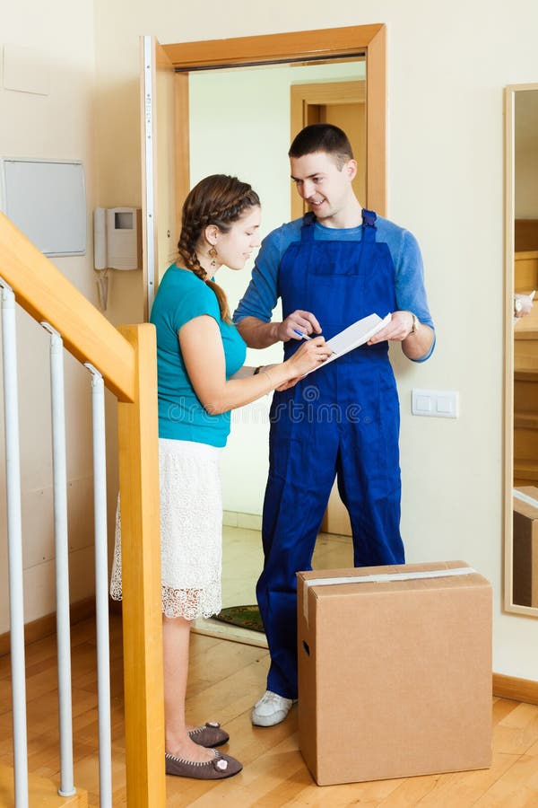 Happy Mailman Uniform Brought Package To Girl Home Stock