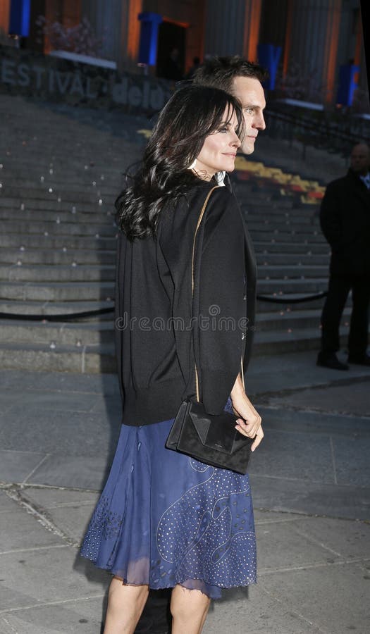 Actress, director and filmmaker Courteney Cox, then 49, arrives at the New York State Supreme Courthouse in Lower Manhattan on April 23, 2014, for the Vanity Fair Party for the 2014 Tribeca Film Festival at the New York State Supreme Courthouse in Lower Manhattan. She is perhaps best known for playing the role of Monica Geller in the long-running popular sitcom, Friends. Cox is accompanied by her boyfriend Johnny McDaid, a singer, songwriter, musician record producer and member of the Snow Patrol band. He is from Northern Ireland. Actress, director and filmmaker Courteney Cox, then 49, arrives at the New York State Supreme Courthouse in Lower Manhattan on April 23, 2014, for the Vanity Fair Party for the 2014 Tribeca Film Festival at the New York State Supreme Courthouse in Lower Manhattan. She is perhaps best known for playing the role of Monica Geller in the long-running popular sitcom, Friends. Cox is accompanied by her boyfriend Johnny McDaid, a singer, songwriter, musician record producer and member of the Snow Patrol band. He is from Northern Ireland.