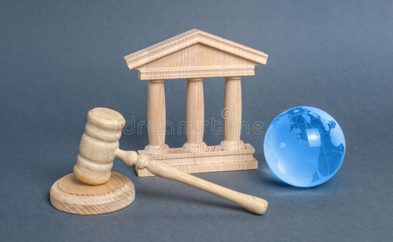 Courthouse, gavel and blue globe planet earth. International Court. Protection of business interests and human rights royalty free stock photography Courthouse, gavel and blue globe planet earth. International Court. Protection of business interests and human rights royalty free stock photography