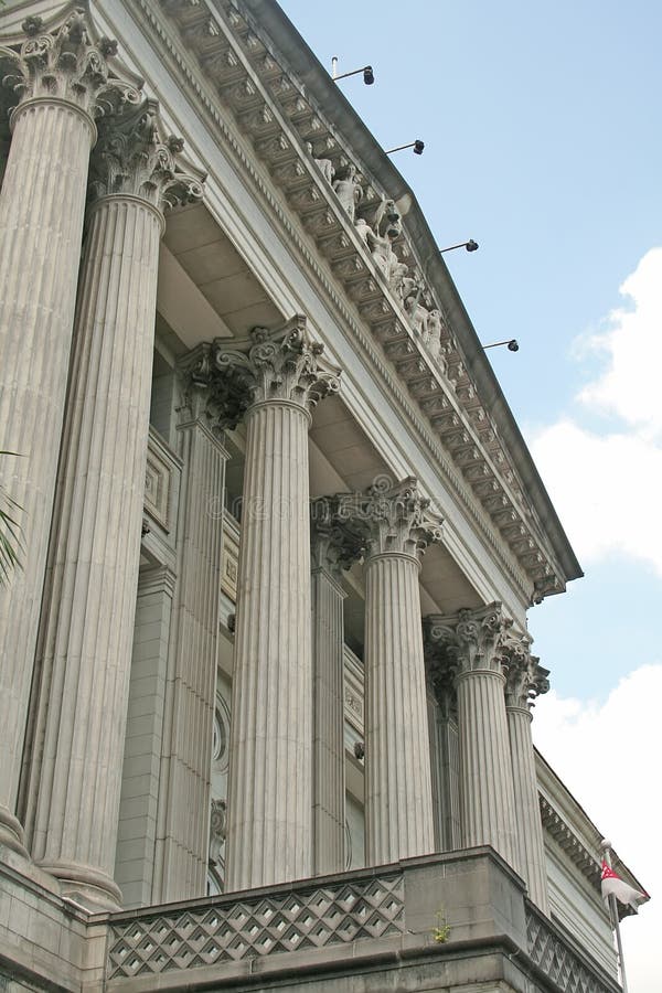 Courthouse with pillars facing the sky