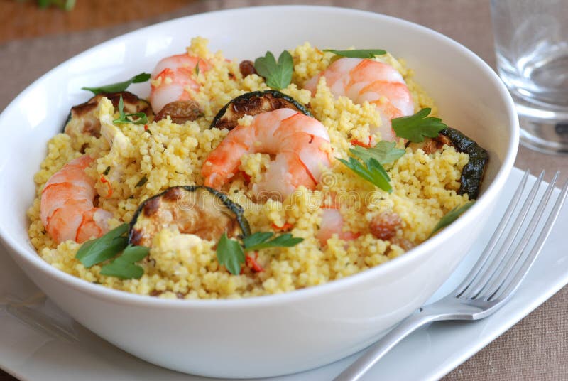 Couscous with prawns stock photo. Image of courgette 15554144
