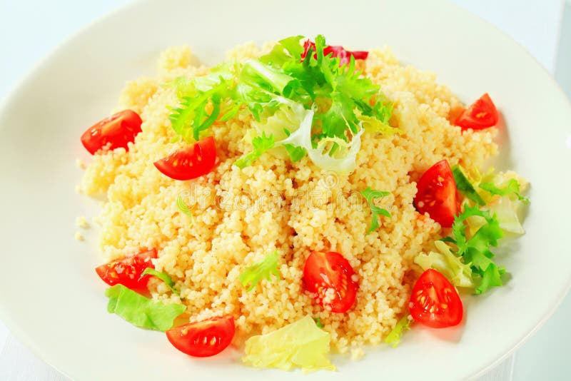 Couscous with Salad Greens and Tomatoes Stock Image Image of plate
