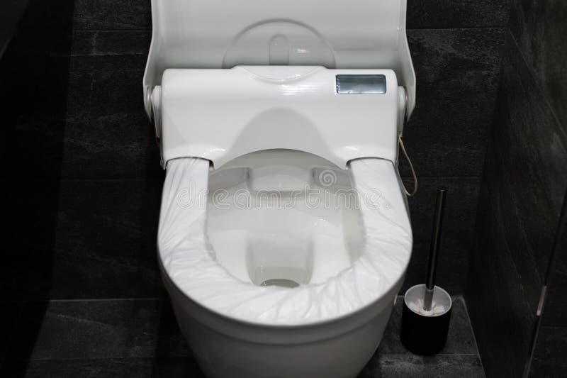 Coussin De Protection Jetable Sur La Jante Du Siège De Toilette