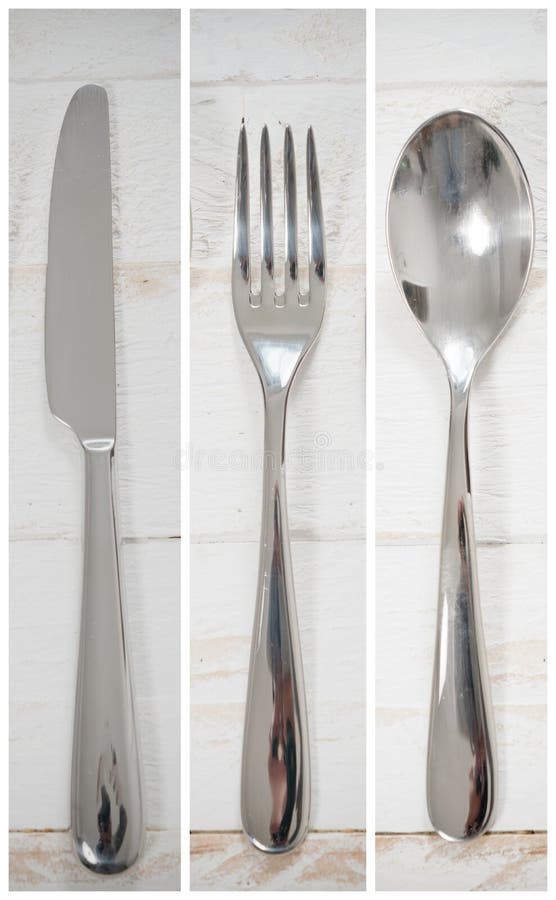 Couteau, cuillère et fourchette sur une table en bois blanche photographie stock Couteau, cuillère et fourchette sur une table en bois blanche photographie stock