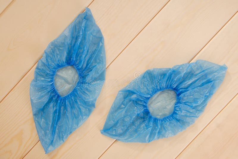 Couvertures bleues de chaussure, butins photographie stock Couvertures bleues de chaussure, butins photographie stock