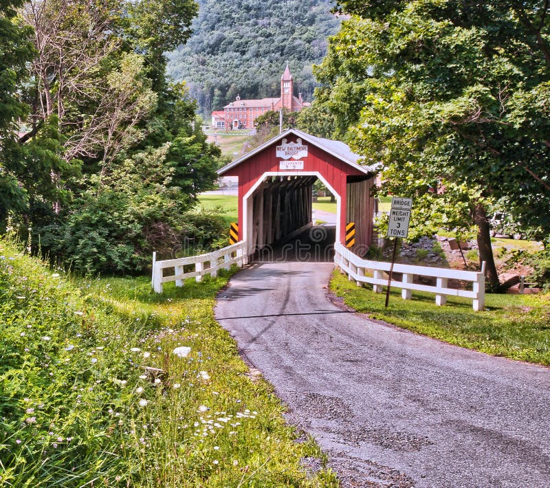 Red Covered Bridge on a peaceful country road.