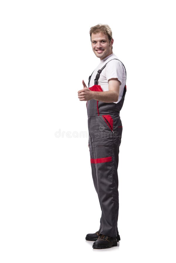 Coveralls молодого рабочий-строителя нося изолированные на белизне стоковые изображения