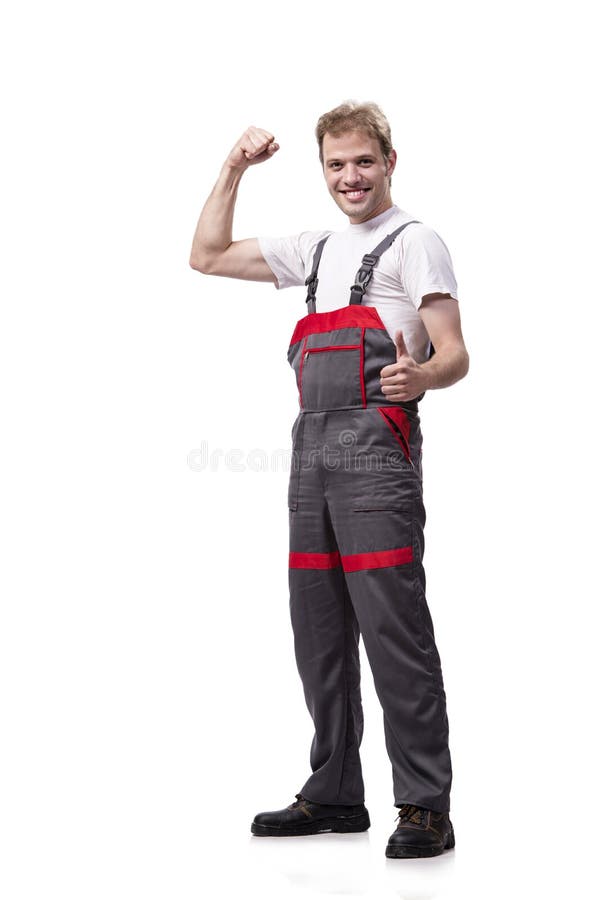 Coveralls молодого рабочий-строителя нося изолированные на белизне стоковая фотография