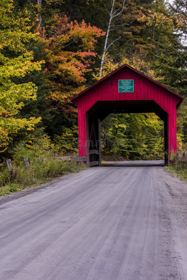 Covered Bridge and Gravel Road - Autumn / Fall - Vermont royalty free stock photography Covered Bridge and Gravel Road - Autumn / Fall - Vermont royalty free stock photography