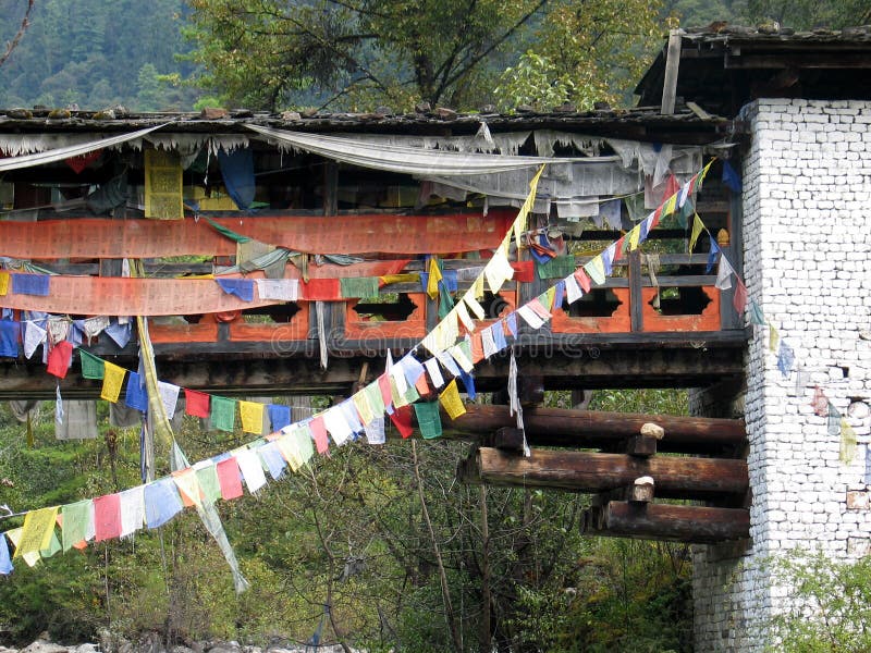 Covered bridge and prayer flags