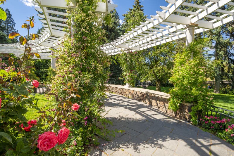 The covered pergola of the Manito Park pavilion and Rose Garden in Spokane, Washington stock photo The covered pergola of the Manito Park pavilion and Rose Garden in Spokane, Washington stock photo