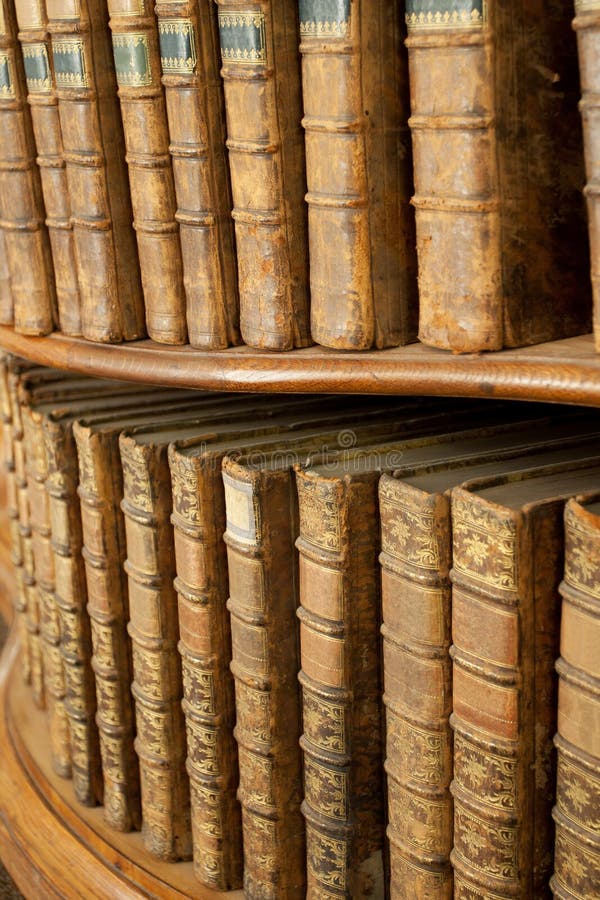 Covers of Old Medieval Books on Shelf in Bookcase Stock Photo Image