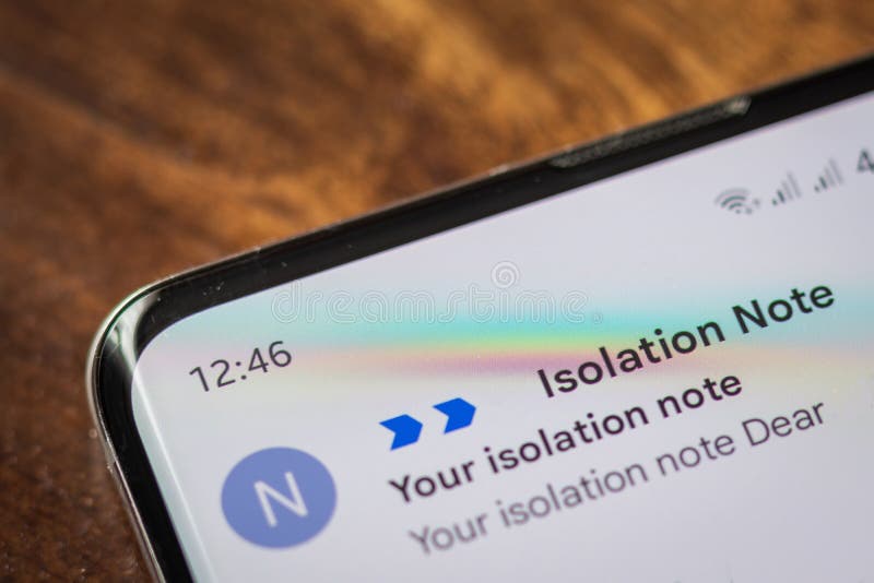 Covid 19 isolation note email notification on smartphone screen in england UK