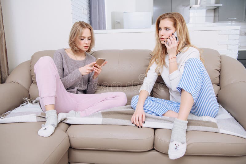 Two young girls stay at home