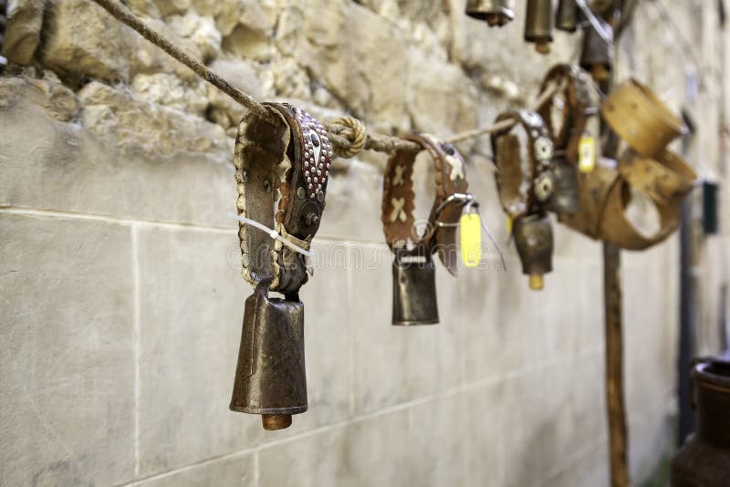 Cow bells hanging stock photo. Image of brown, street 181089226