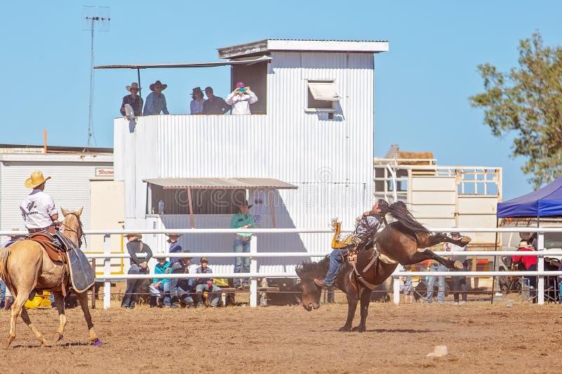 BOWEN RIVER, QUEENSLAND, AUSTRALIA - JUNE 10TH 2018: Cowboy competing in the Bareback Bronc event at Bowen River country rodeo