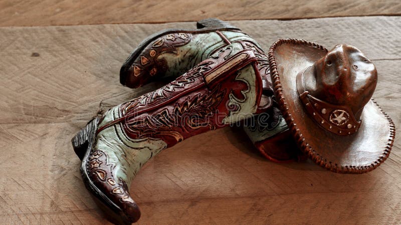 Cowboy- eller flickakängor med en hatt royaltyfria bilder Cowboy- eller flickakängor med en hatt royaltyfria bilder