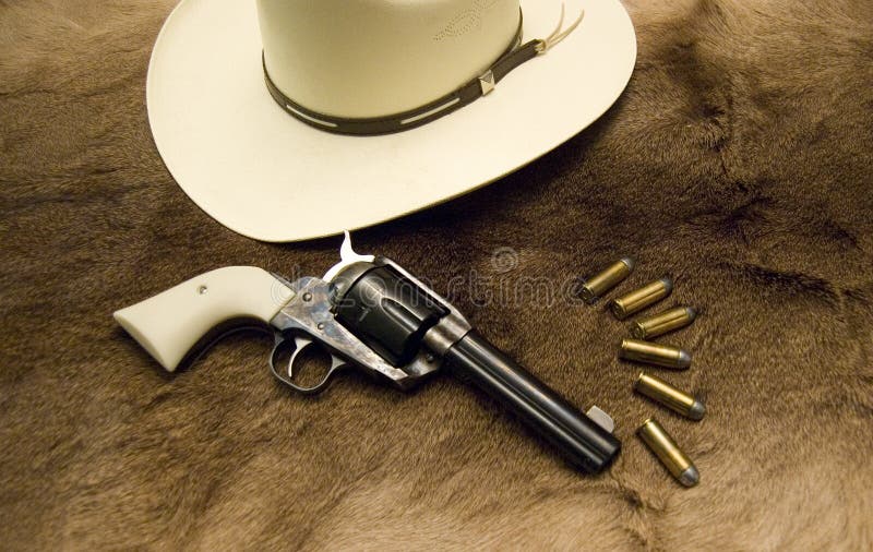 Cowboy Hat and Gun stock image. Image of band, handgun 12274575