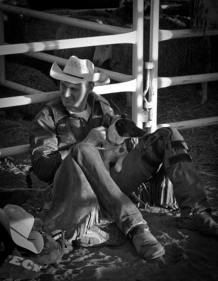 Cowboy with his dog editorial stock image. Image of tournament - 23940854