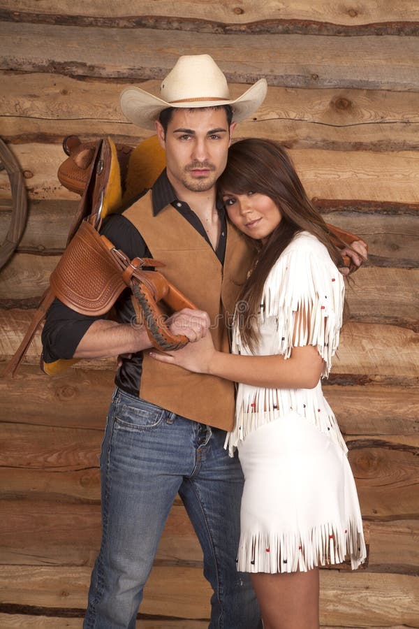 Cowboy and Indian woman saddle on back both look