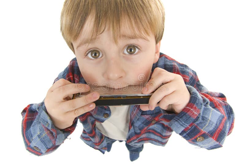 Musical cowboy preschooler plays harmonica fish eye lens perspecitve