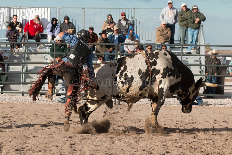 Indian cowboy rodeo bull riding in Arizona.