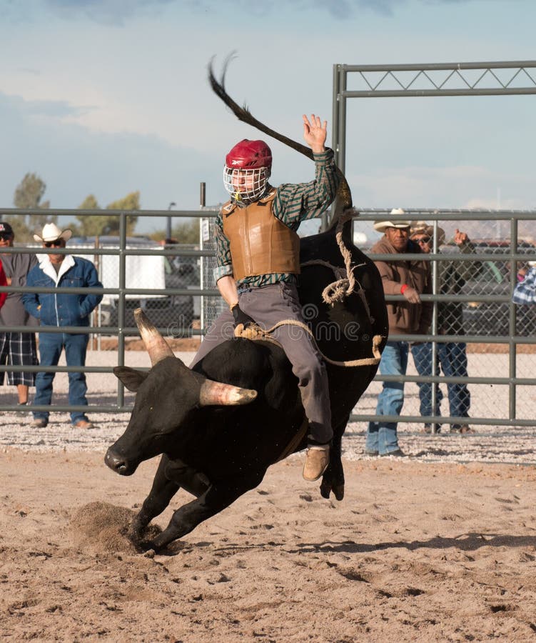 Indian cowboy rodeo bull riding in Arizona.