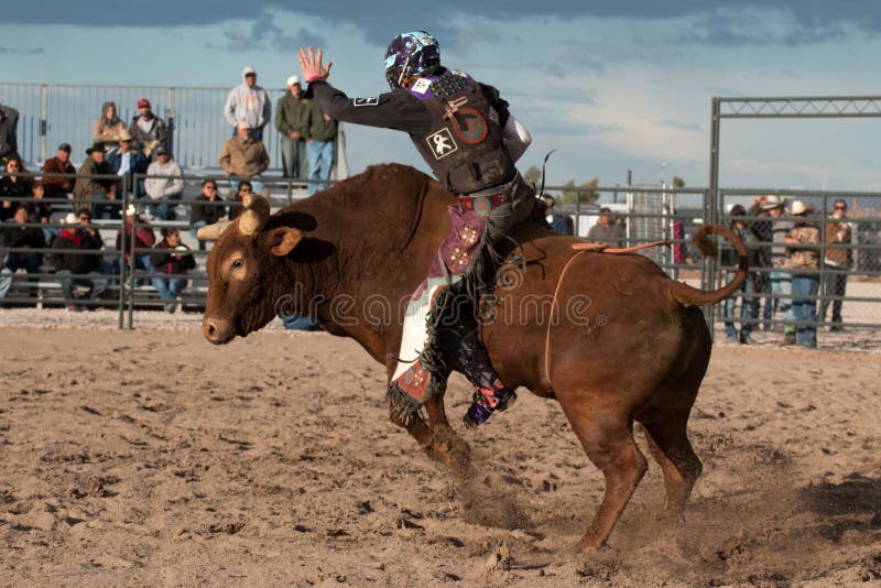 Indian cowboy rodeo bull riding in Arizona.