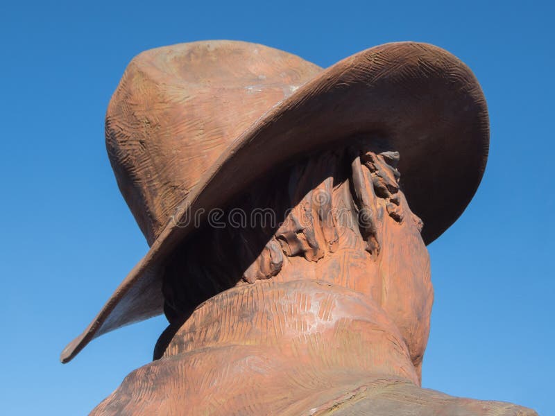 Cowboy skulptur från baksidan royaltyfri foto Cowboy skulptur från baksidan royaltyfri foto