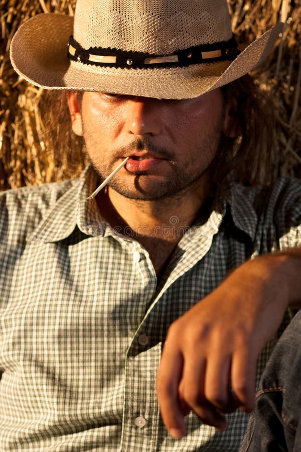 cowboy-straw-his-mouth-20970240.jpg