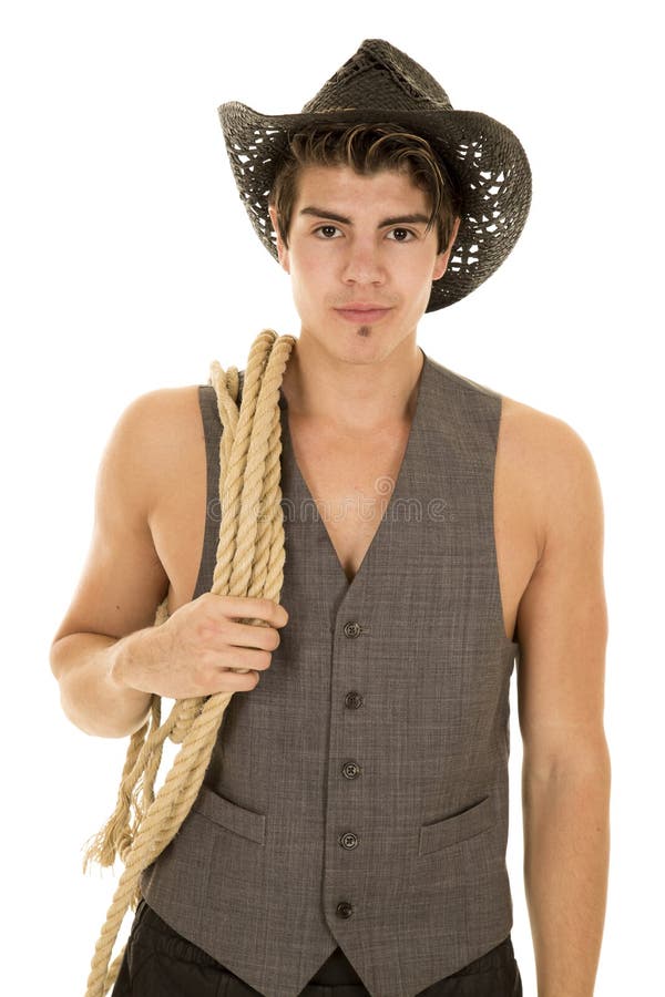 Cowboy in vest met kabel op schouder royalty-vrije stock afbeeldingen Cowboy in vest met kabel op schouder royalty-vrije stock afbeeldingen