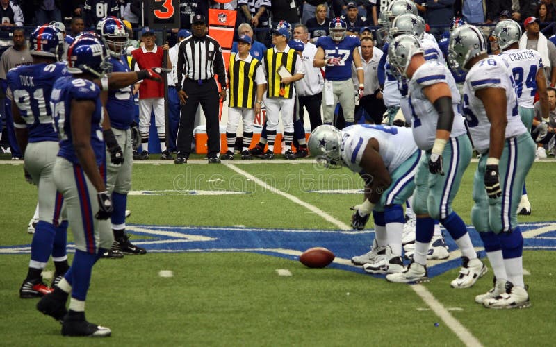 DALLAS - DEC 14: Taken in Texas Stadium on Sunday, December 14, 2008. Tony Romo and the Dallas Cowboys lineup against the NY Giants. DALLAS - DEC 14: Taken in Texas Stadium on Sunday, December 14, 2008. Tony Romo and the Dallas Cowboys lineup against the NY Giants.