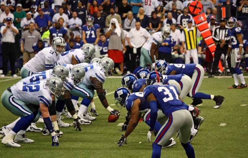 DALLAS - DEC 14: Taken in Texas Stadium on Sunday, December 14, 2008. Dallas Cowboys Quarterback Tony Romo waits for the snap from the center. DALLAS - DEC 14: Taken in Texas Stadium on Sunday, December 14, 2008. Dallas Cowboys Quarterback Tony Romo waits for the snap from the center.