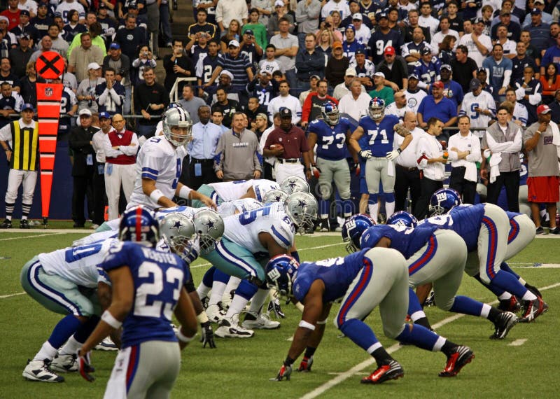 DALLAS - DEC 14: Taken in Texas Stadium on Sunday, December 14, 2008. Dallas Cowboys Quarterback Tony Romo waiting for the snap from center. DALLAS - DEC 14: Taken in Texas Stadium on Sunday, December 14, 2008. Dallas Cowboys Quarterback Tony Romo waiting for the snap from center.