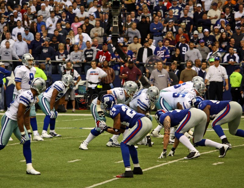 DALLAS - DEC 14: Taken in Texas Stadium on Sunday, December 14, 2008. Tony Romo and the Dallas Cowboys lineup against the NY Giants. DALLAS - DEC 14: Taken in Texas Stadium on Sunday, December 14, 2008. Tony Romo and the Dallas Cowboys lineup against the NY Giants.