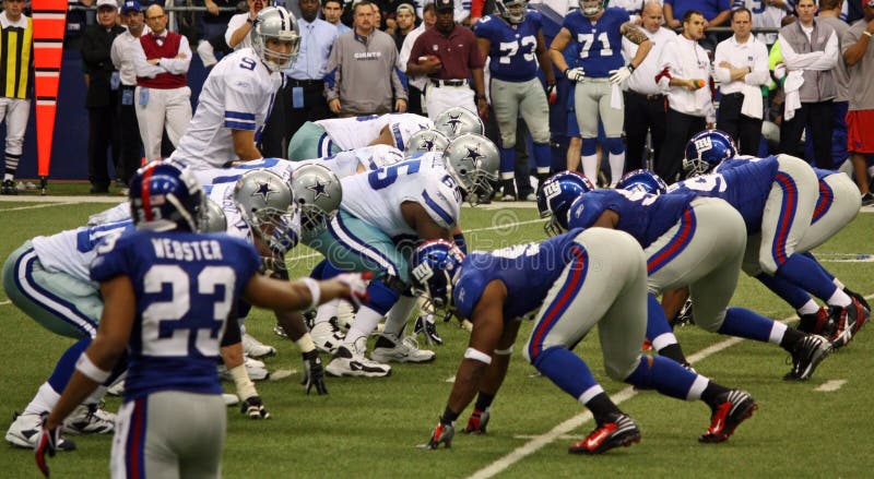 DALLAS - DEC 14: Taken in Texas Stadium on Sunday, December 14, 2008. Tony Romo and the Dallas Cowboys line up against the NY Giants. DALLAS - DEC 14: Taken in Texas Stadium on Sunday, December 14, 2008. Tony Romo and the Dallas Cowboys line up against the NY Giants.