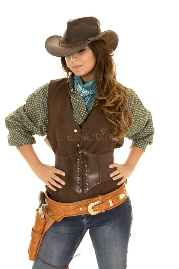 Cowgirl with gun and holster hands on hips