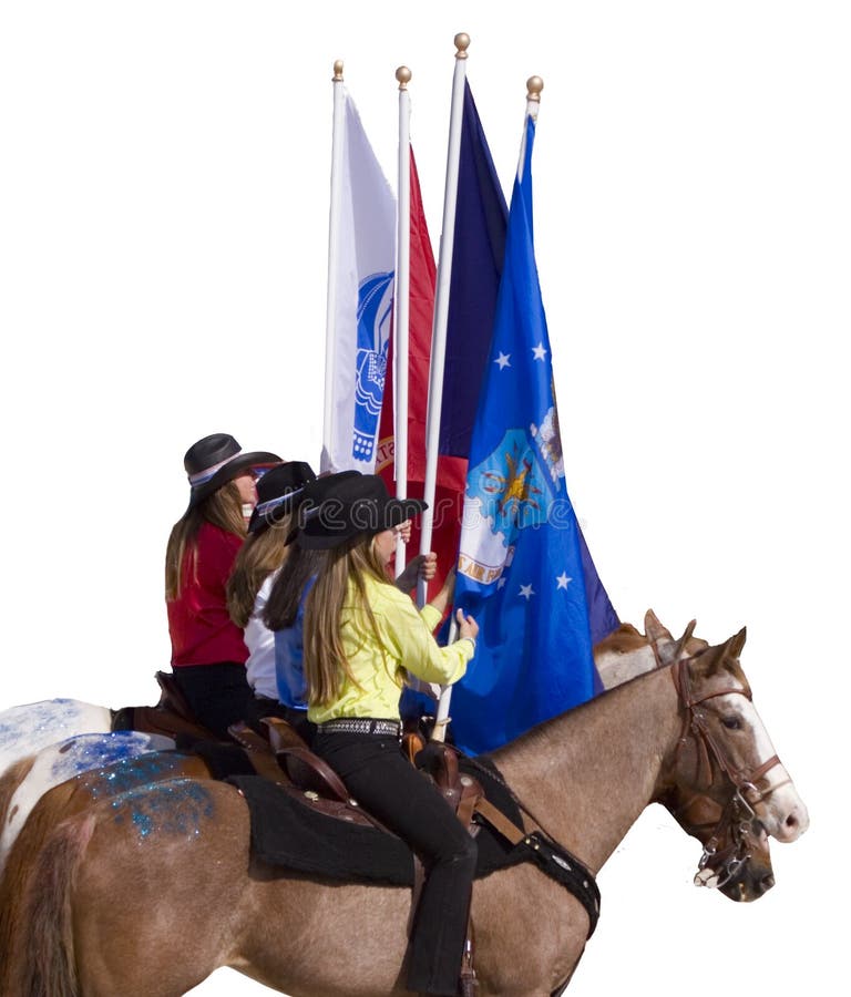 Cowgirls holding flags at the opening ceremonies of a rodeo