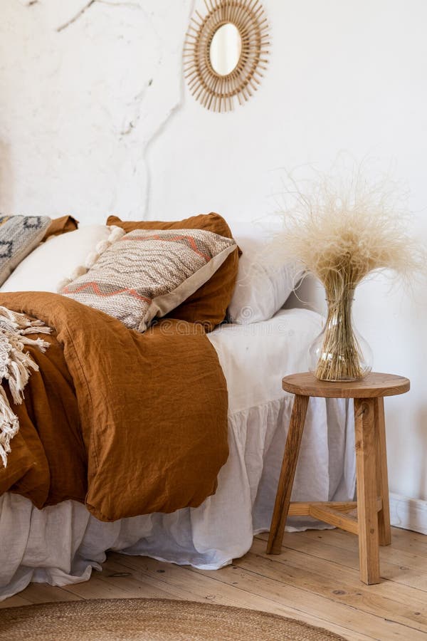 Cozy apartment in boho chic style interior with comfort bedroom